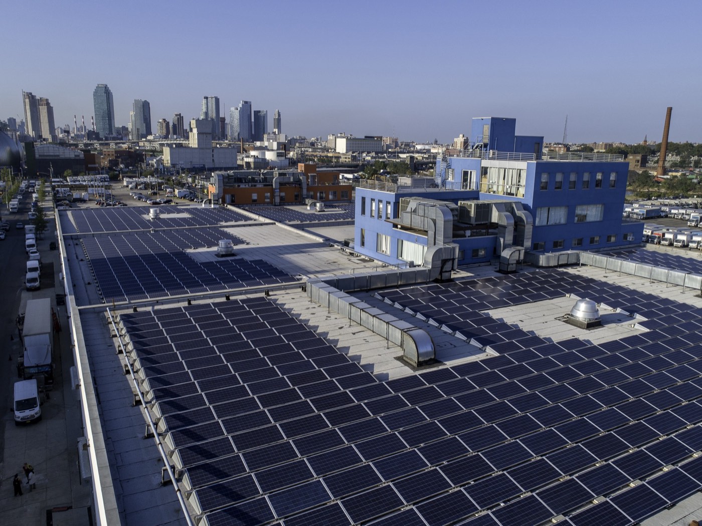 Aerial drone view of solar panels installed on a rooftop